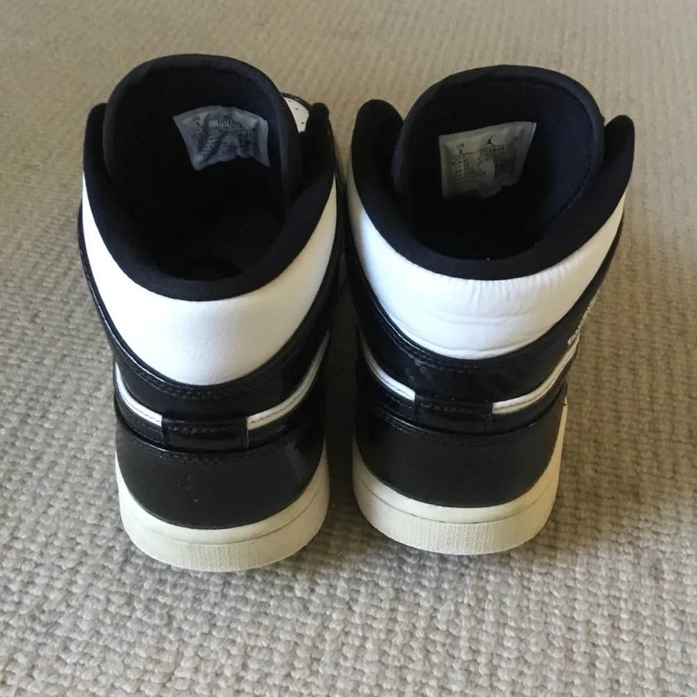 Jordan Black and White High-Top Sneakers